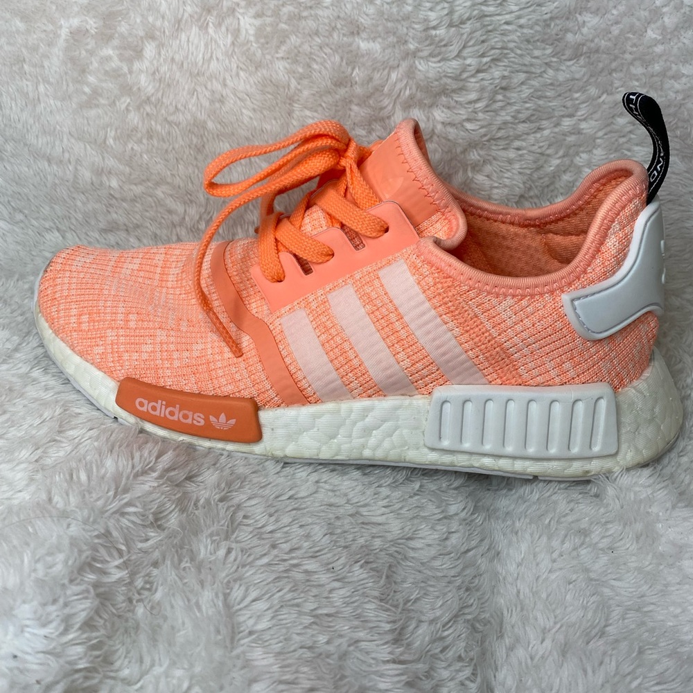 Woman’s ADIDAS NMD R1 salmon sneaker
